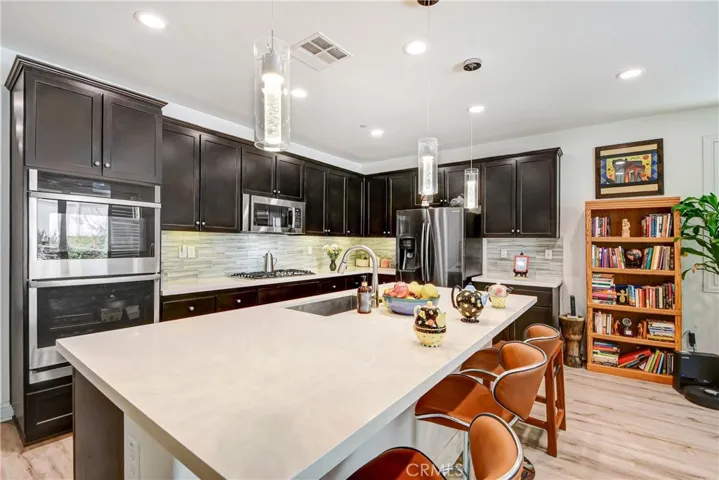 Kitchen with Ample Cabinetry and steel appliances