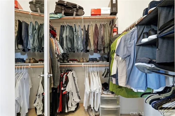 Primary walk-in closet 1