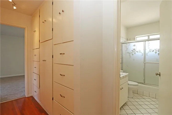Tons of linen cabinets and drawers in the hallway.