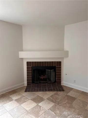 Cozy up in the living room and enjoy your time in front of the fireplace.