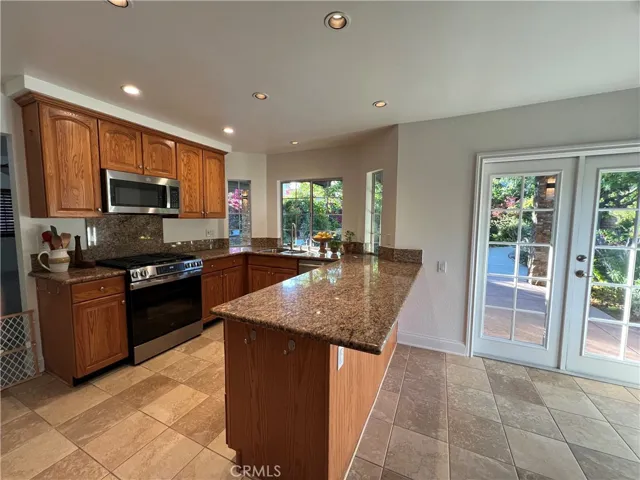 Stunning view of the renovated kitchen featuring high-end finishes and an open-concept layout.