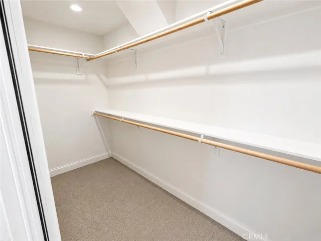 Newly renovated master bedroom featuring a spacious walk-in closet.