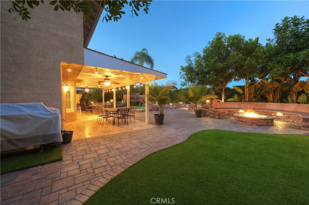 Oversize backyard, beautifully landscaped, gas fire pit