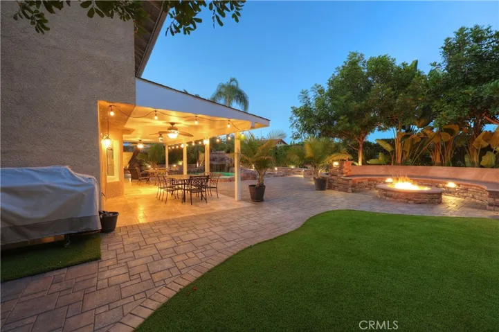 Oversize backyard, beautifully landscaped, gas fire pit