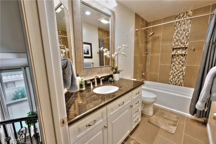 Beautiful upgraded hall bathroom with tub