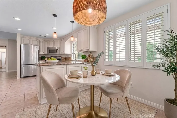 Virtually Staged/Enhanced Eat in kitchen area
