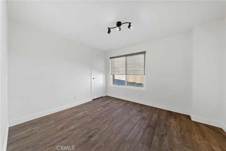 Bedroom #2 features laminate flooring