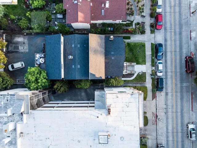 Aerial perspective showcasing a residential street with multiple properties