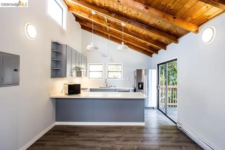 Vaulted wood-plank ceiling with exposed beams