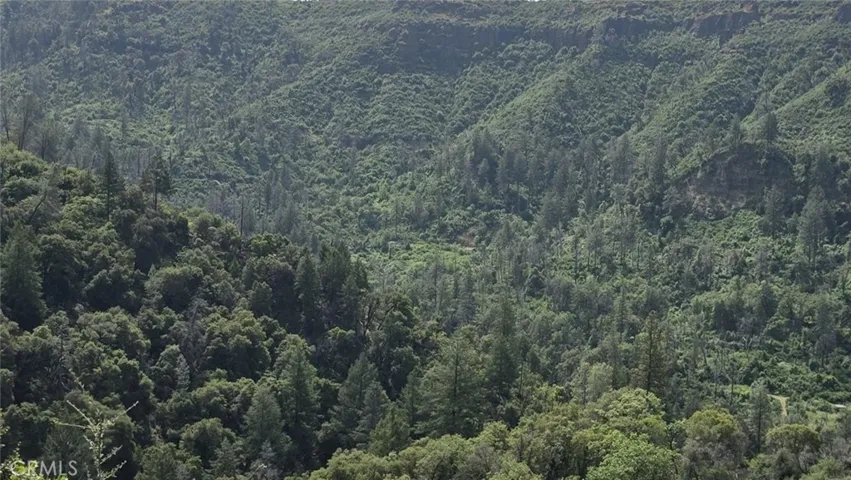 Distant view of mine & hillside