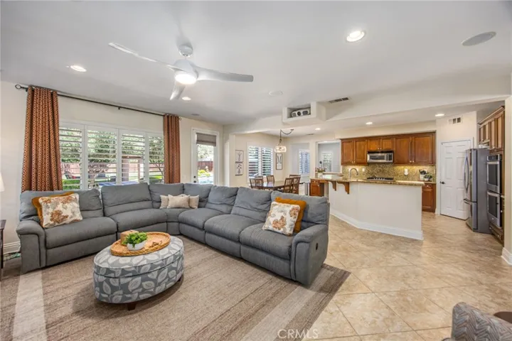 Open-concept family room with seamless flow to the kitchen and casual dining area