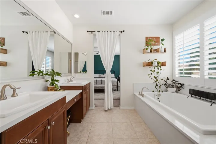 Primary bathroom dual sinks.
