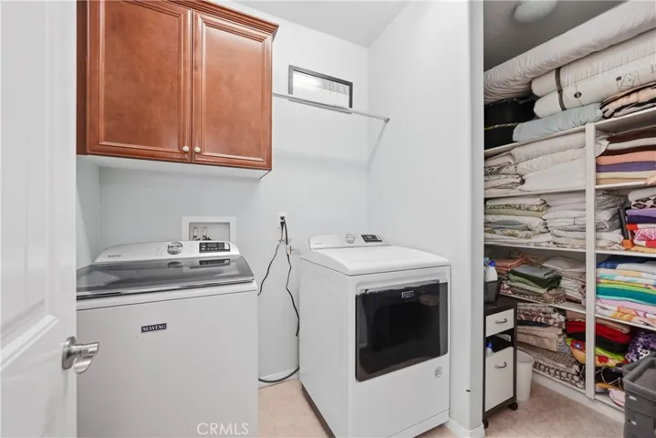 Upstairs Laundry Room and linen storage area.