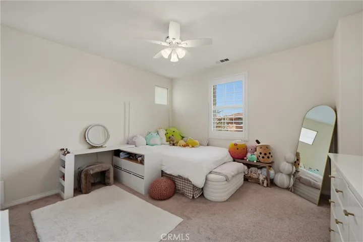 Secondary Bedroom 1 with walk in closet.