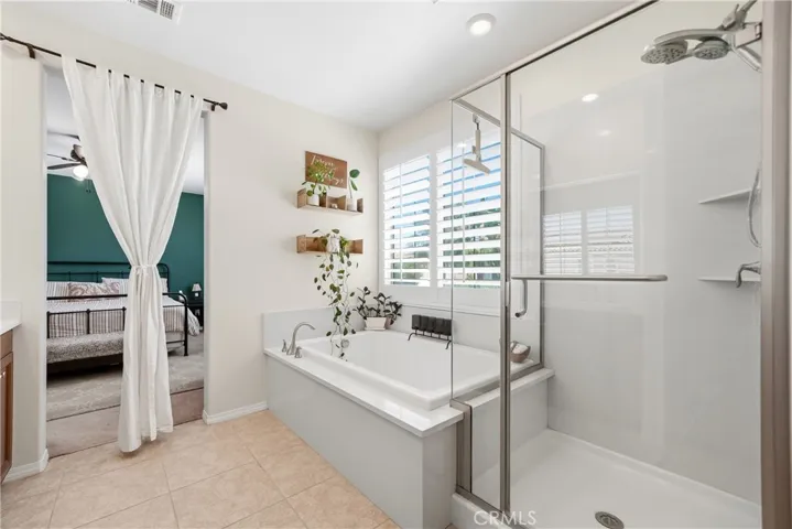 Primary bedroom walk-in shower.