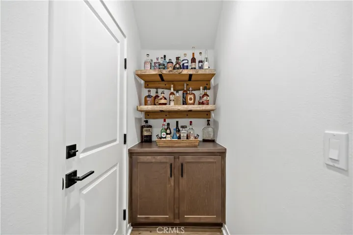 Built in cabinetry from garage access (barnwood shelves will not convey)