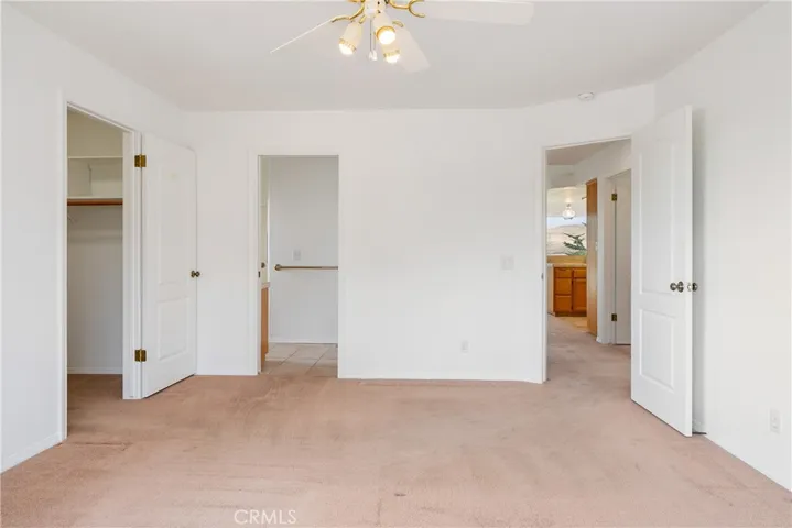 There is a walk in closet in the primary bedroom and an ensuite full bath