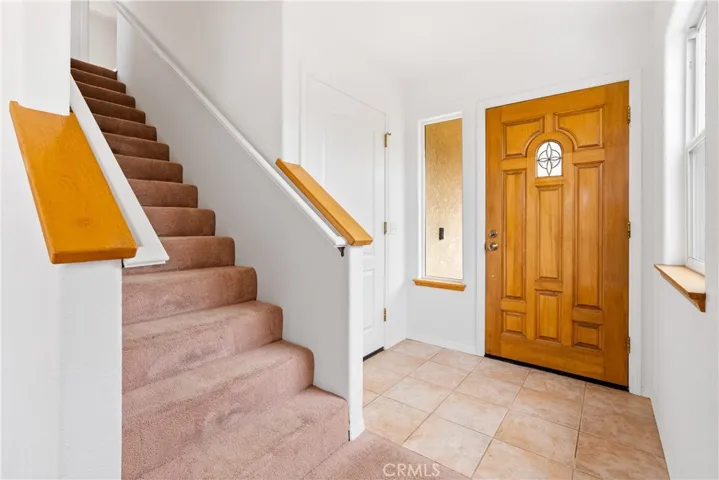 The entry way has access to the garage from a separate door for easy unloading of groceries from the garage