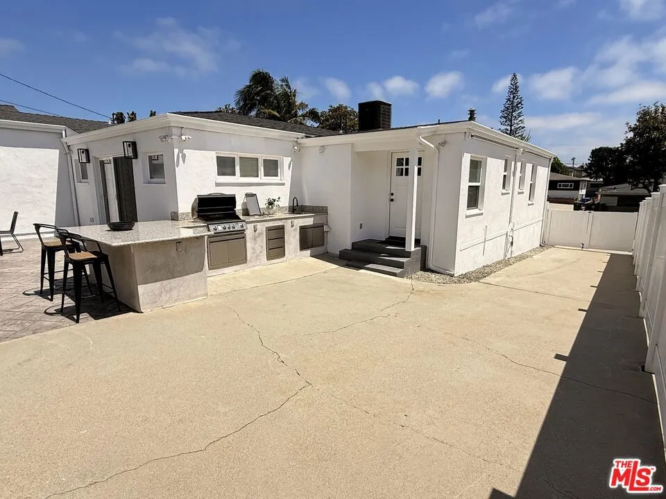 BBQ island, back door & drivew