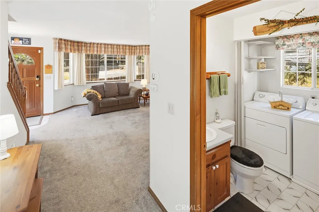 1/2 Bath with Washer/Dryer area