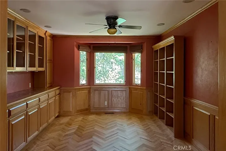 The formal dining room offers a gracious space for gathering