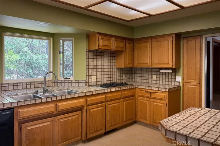 From the entryway on the right into the spacious kitchen