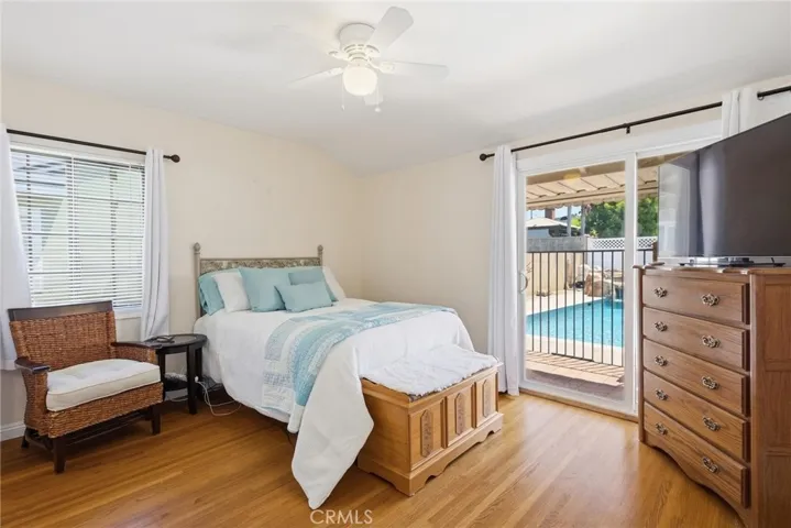 PRIMARY BEDROOM WITH SLIDER TO PATIO