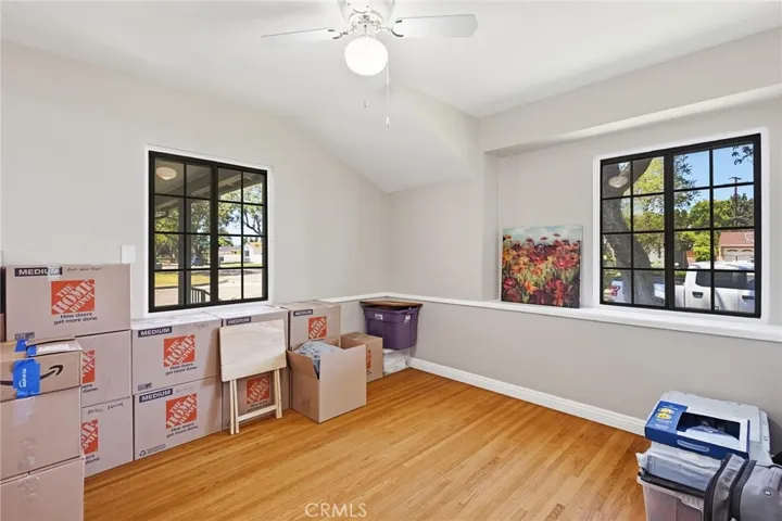 SECOND BEDROOM WITH MOVING BOXES