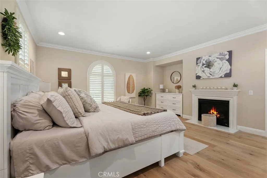 Second master bedroom with fireplace and balcony