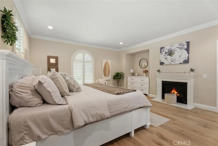 Second master bedroom with fireplace and balcony
