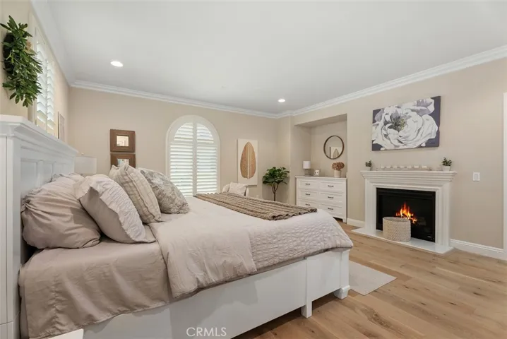 Second master bedroom with fireplace and balcony