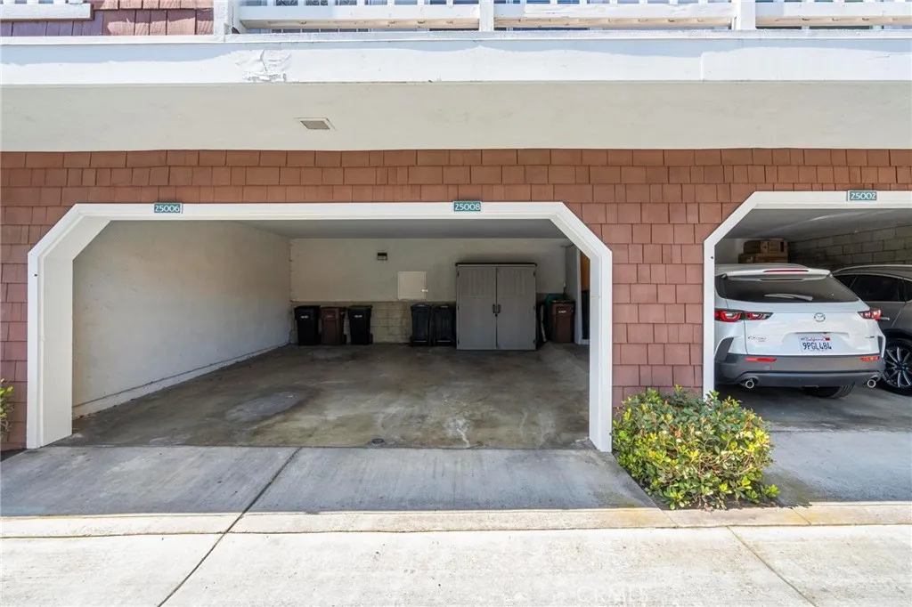 Carport with storage shed