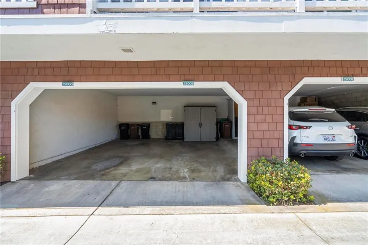 Carport with storage shed