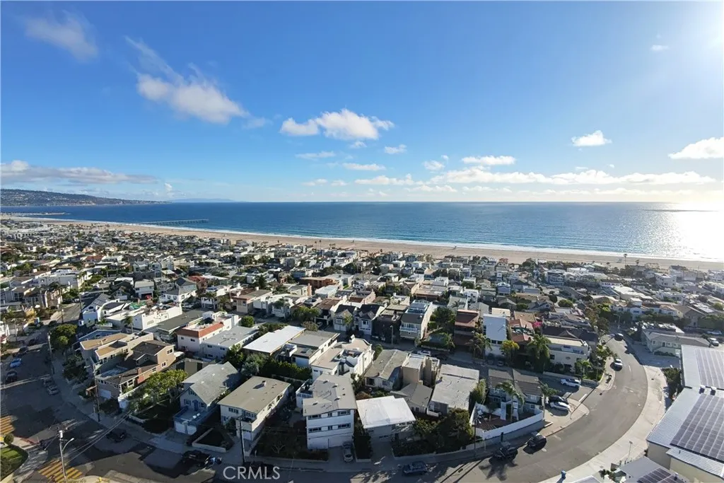 Ahh....to live at the beach.  428 25th is the home in the foreground with the white roof