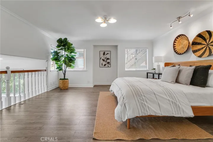 Spacious Primary En-suite, step down to sitting area, walk in closet, and private primary bath