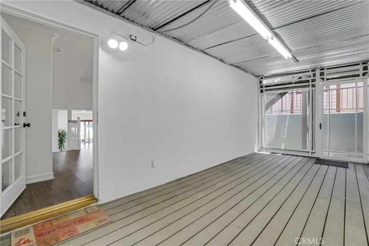 Open area off Primary Bedroom great for gym, hobby, or storage.