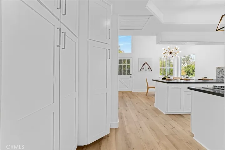 Kitchen with 6 door pantry.