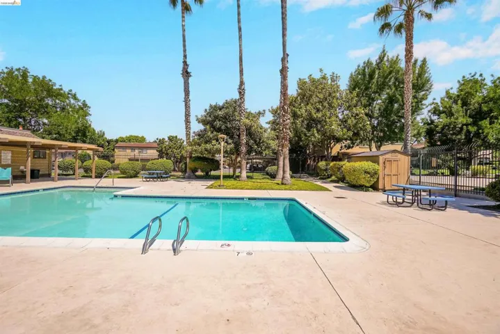 Outdoor swimming pool with concrete decking