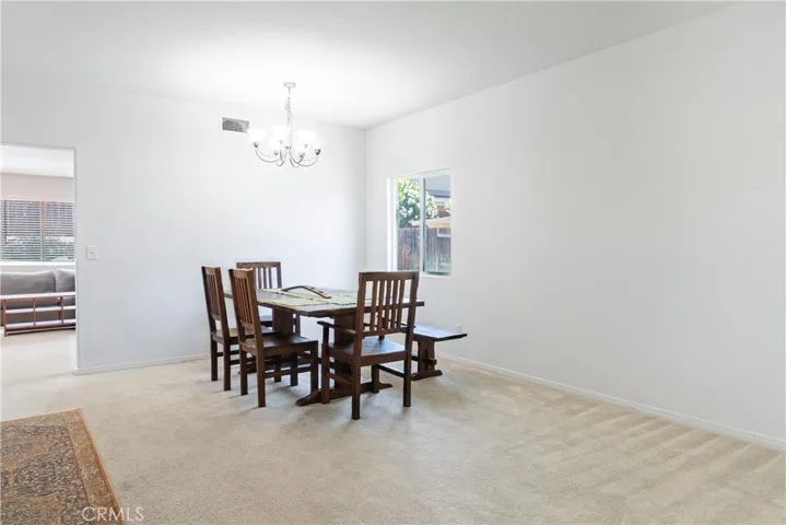 Spacious living room with formal dining area.