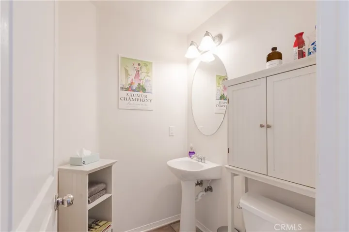 Half bath downstairs near kitchen and laundy.