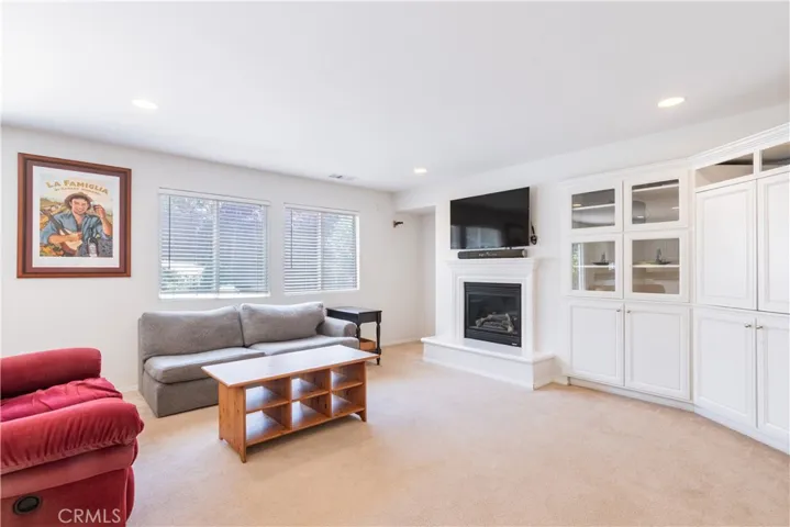 The family room has plenty of storage space and is a great spot for watching TV!