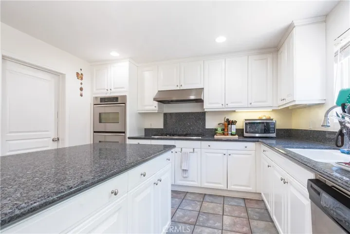 Additional view of kitchen.