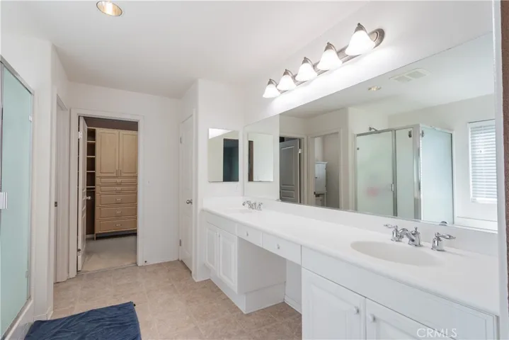Primary bath with walk-in closet.
