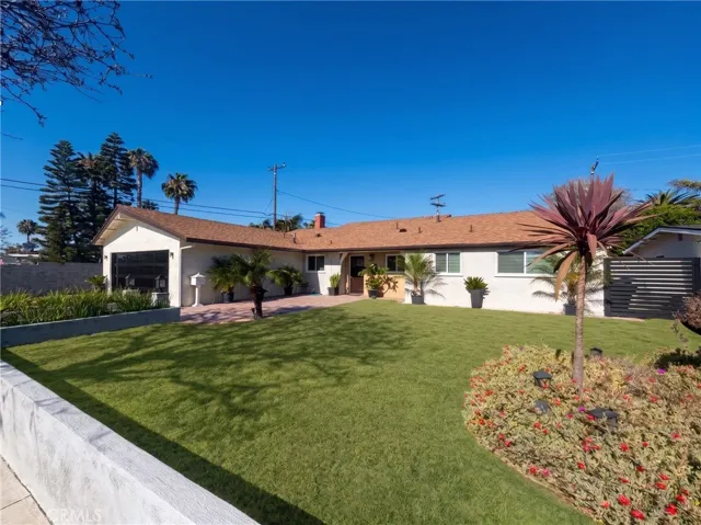 Quiet interior street on pie-shaped lot. New garage door, new gates. RV parking.
