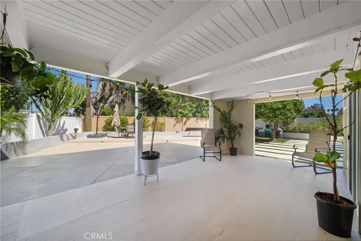 Large covered patio area providing shade as well.