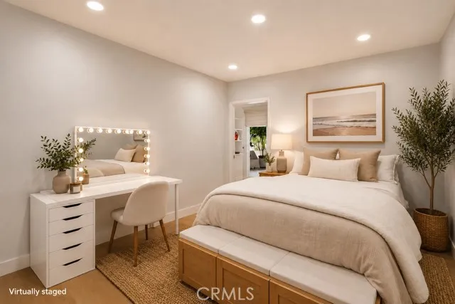 Bedroom 2 on first floor with private entrance and private bath. 
Virtually staged.