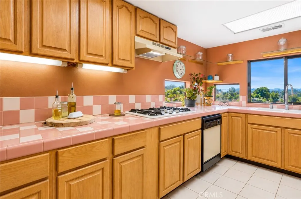 Beautiful kitchen with abundant cabinet space, offering plenty of storage and functionality.