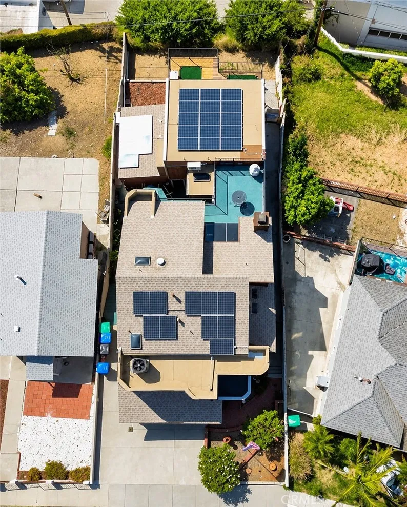 An exceptional multi-level property offering 6 bedrooms, 5.5 bathrooms, 3,139 sq. ft. of versatile living space on a 5,580 sq. ft. lot, plus 31 solar panels to be paid off at close of escrow—giving the future homeowner the benefit of solar energy without an ongoing solar payment.