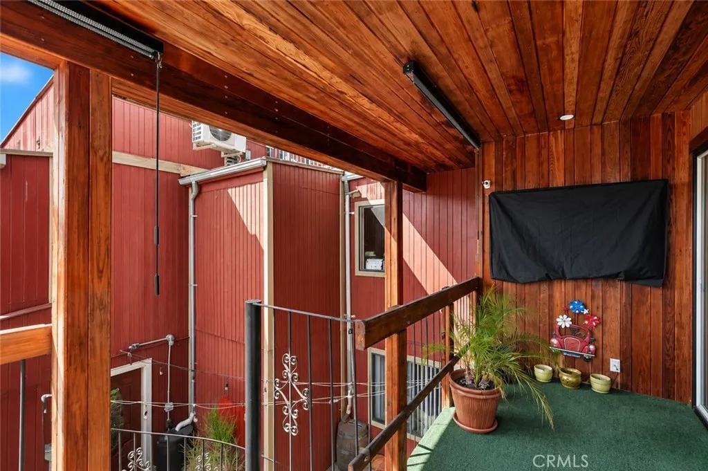 Step outside the kitchen onto the redwood deck—the perfect spot to relax, unwind, and enjoy your favorite movie under the evening sky.