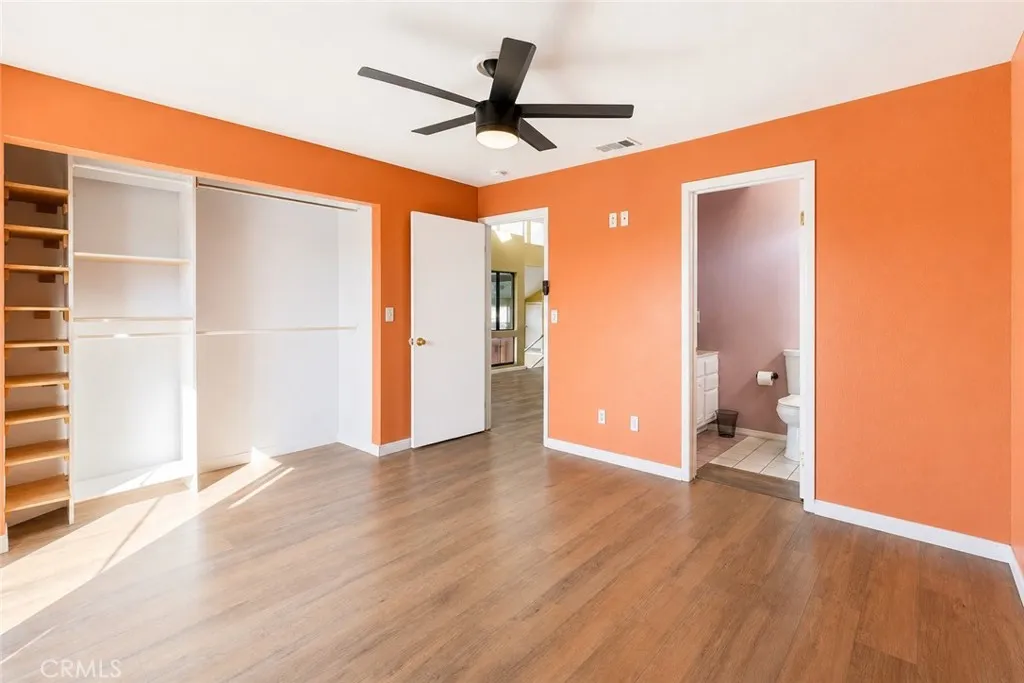 Spacious third-level primary suite featuring a private bathroom for added comfort and privacy.